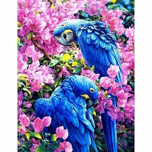 Blauwe papegaaien tussen de roze bloemen - 3